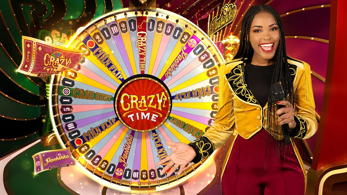 Crazy Time live studio with the host standing beside the wheel